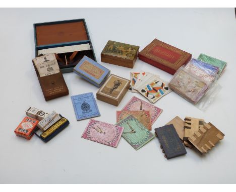A collection of vintage games and playing card accessories including whist markers, card boxes, poker, dice etc&nbsp;