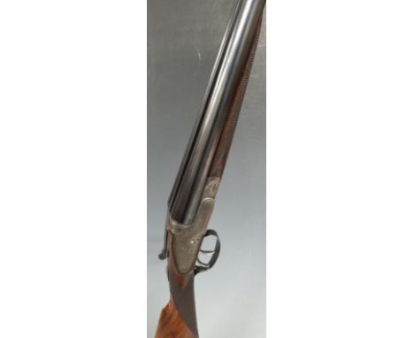 Army & Navy CSL of London 12 bore sidelock side by side shotgun, scrolling engraving to the named locks, top strap, thumb lev