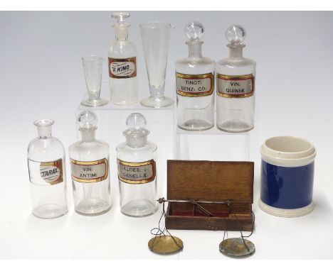 Quantity of apothecary jars or bottles, travelling beam scales etc
