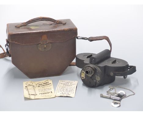 WWII era mechanical Filmo cine camera by Bell, Howell &amp; Co, Chicago, in fitted leather case