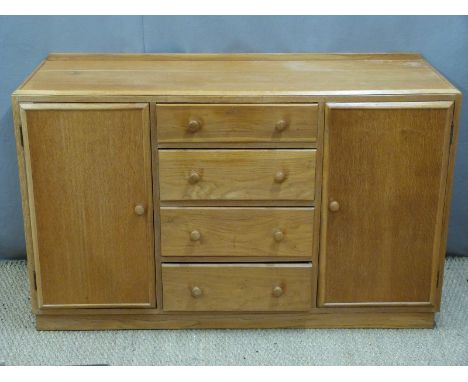 Ercol style Arts &amp; Crafts light elm or similar sideboard having four drawers flanked by cupboards, W137 x D51 x H51cm