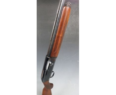 BSA 200A semi-automatic shotgun with border engraved lock, chequered semi-pistol grip and forend, sling suspension mounts, ve