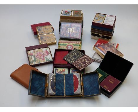 Twenty-four vintage double decks of playing cards including some advertising related, all in original boxes/wallets&nbsp;