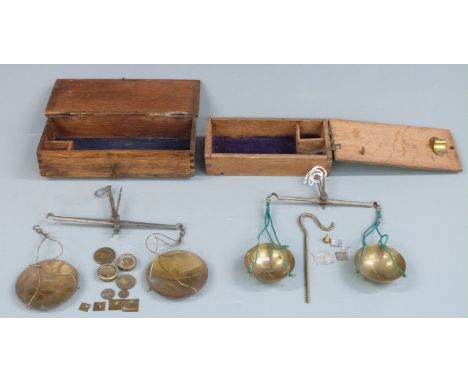 Two sets of 18thC / 19thC travelling beam scales including various apothecary weights