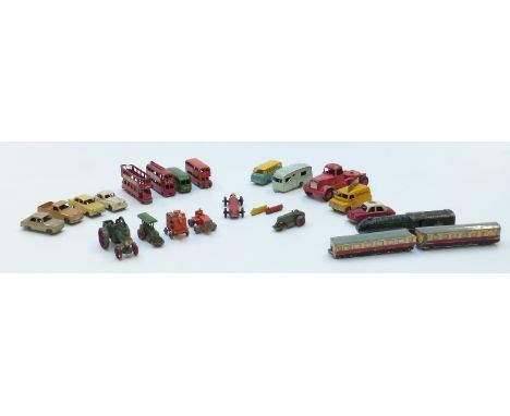 Twenty four Dinky Toys and Matchbox Lesney 1075 series diecast model vehicles including trains, Evening News advertising van,