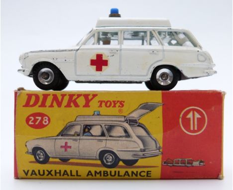 Dinky Toys diecast model Vauxhall Ambulance with white body, green interior, white driver, blue light and spun hubs 278, in o