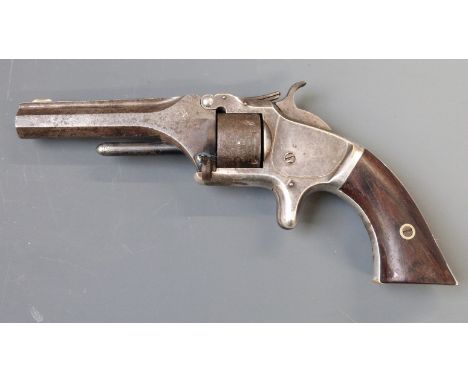 Deactivated&nbsp; Smith &amp; Wesson Model 1 2nd issue seven shot .22 rim-fire revolver with sheath trigger, shaped wooden gr