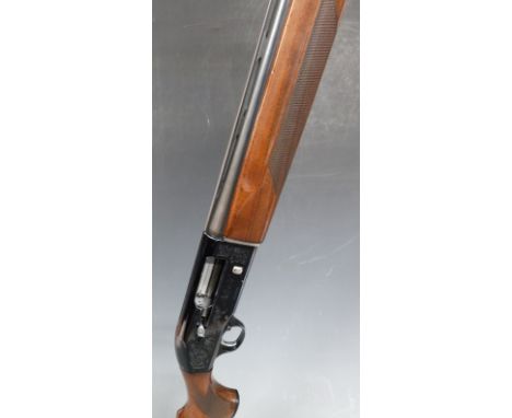 Beretta A303 12 bore semi-automatic shotgun with engraved locks, chequered semi-pistol grip, single trigger and vented top ri