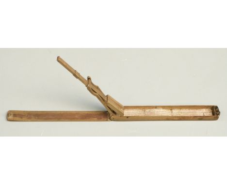 Georgian brass cased folding guinea scale with rule to outside of case