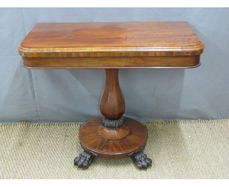 Regency mahogany folding card table, the hinged and folding top leading to baluster octagonal column, circular plinth and orn