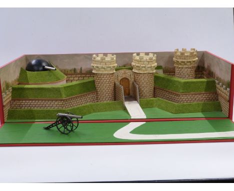 CBG Mignot diecast model diorama of a fort with gun turret in original display box, 76x37x19cm