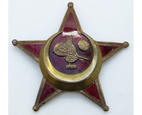 Ottoman WWI medal 'Gallipoli' Star in brass and enamel with crescent moon and Sultan Mehmed V cipher, maker's mark for B.B &a