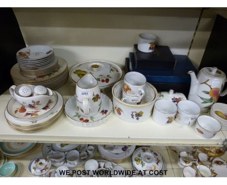 A quantity of Royal Worcester  "Evesham" to include dinner plates, tea plates, serving dishes etc some boxed