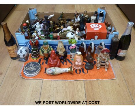 A collection of approximately 60 bottles of novelty miniature spirits and liquors to include Pusser's rum, a selection of Moo
