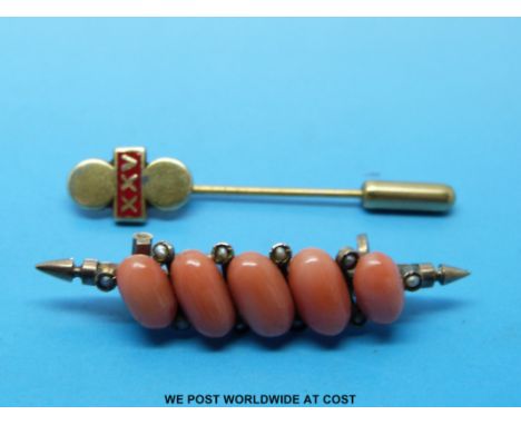 A yellow metal brooch set with coral and seed pearls and a 9ct gold stick pin 