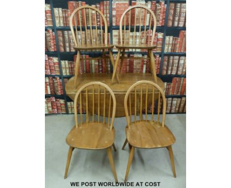 Ercol light elm retro table and four chairs with original cushions (H72 x W110 x max L124cm)