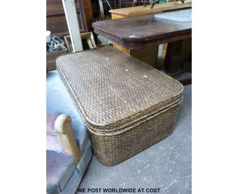 A large wicker trunk/ ottoman (length 125cm depth 68cm)