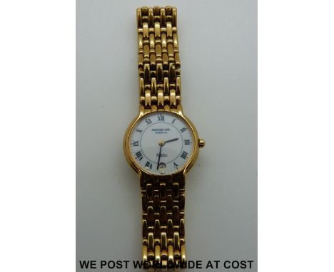 A Raymond Weil Fidelio 18ct gold plated ladies wristwatch with white enamel face, Roman numerals and date aperture