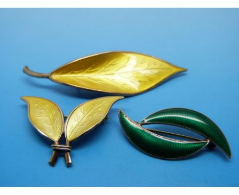 Three silver and enamel brooches in the form of leaves by David Andersen Norway 