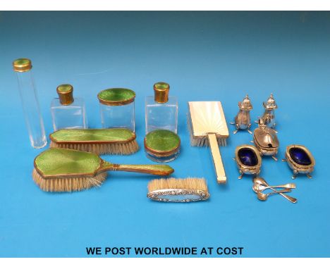 A seven-piece green guilloché enamel dressing table set, two hallmarked silver brushes and a five piece silver plated Mappin 