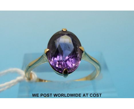 A 9ct gold ring set with an oval amethyst measuring approx 2.35ct (size N) 