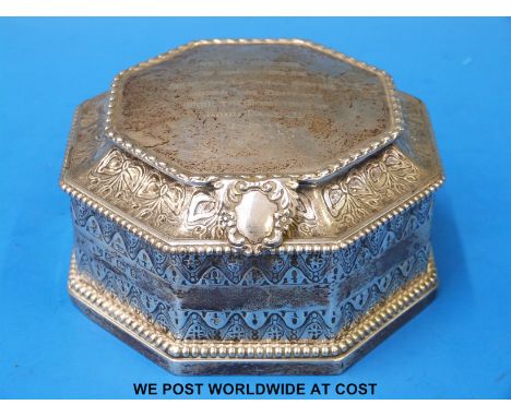 A hallmarked silver octagonal caddy with hinged lid and thumb piece (width 11cm, weight 325g, B'ham makers mark rubbed)