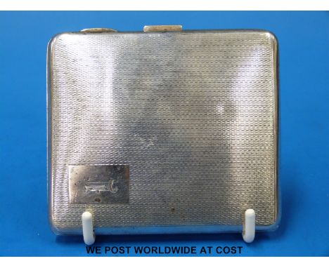 A hallmarked silver case with engine-turned design (weight 80g)