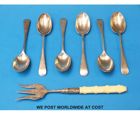 A set of hallmarked silver teaspoons 131g, together with a hallmarked silver pickle fork