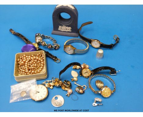 A collection of watches, Wedgwood clock surround etc 
