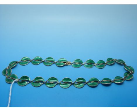 A silver and enamel necklace made up of green leaves by David Andersen Norway 