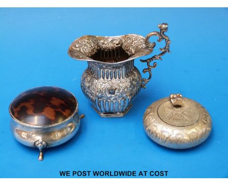 A tortoiseshell lidded hallmarked silver trinket box, another small trinket box and a hallmarked silver embossed jug (weight 