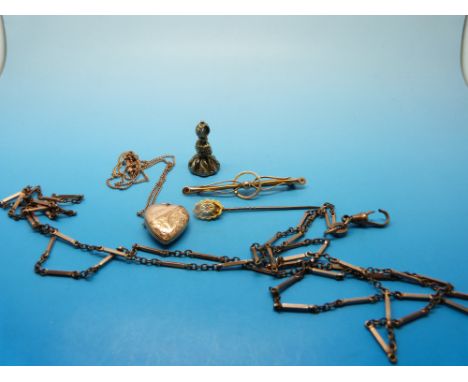 A 9ct gold heart shaped locket, 9ct gold brooch, 15ct gold stick pin, intaglio seal etc