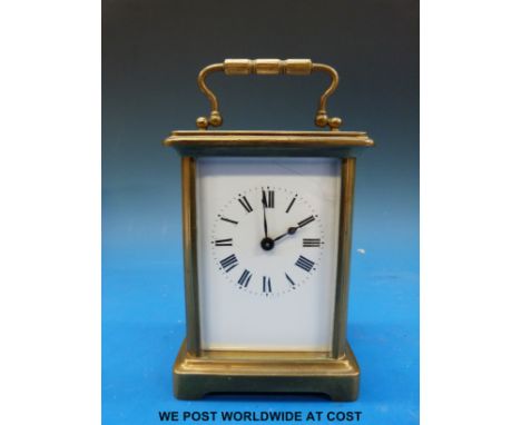 A brass cased carriage clock with keyless movement