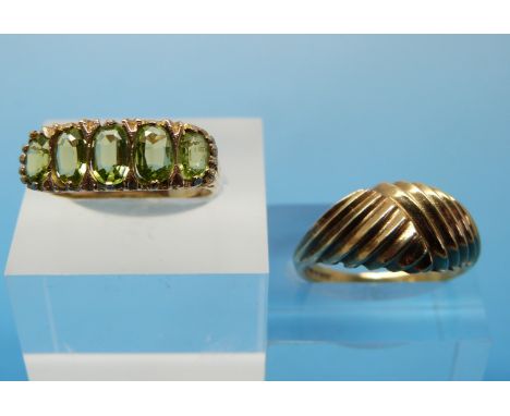 A 9ct gold ring set with five peridots (size Q) and a 9ct gold ring (size R) 