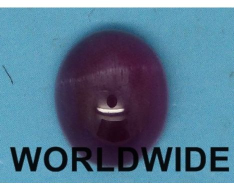A ruby in an oval cabochon cut measuring 8.65ct
