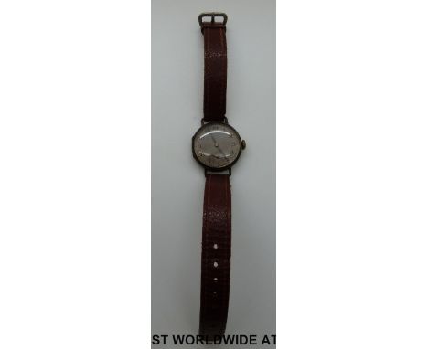 Collingwood gentleman's silver cased wristwatch with engine turned face, subsidiary seconds dial and Arabic numerals on brown