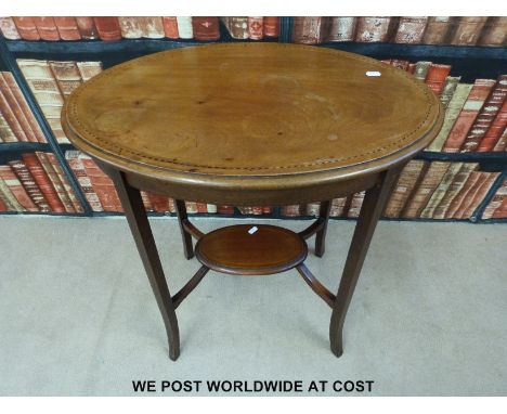 An oval inlaid side table with under-shelf (H72, W46, D46cm) 