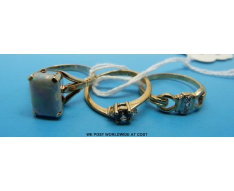 Three 9ct gold rings one set with an opal doublet