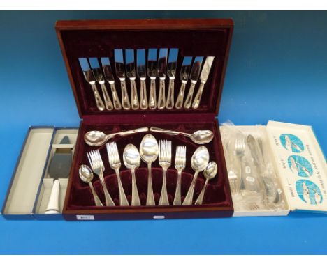 A six place canteen of cutlery together with a cased Royal Worcester cake slice and a fish set