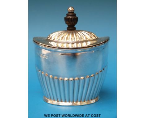 A Victorian hallmarked silver tea caddy with fluted lid and lower half, Sheffield 1896, maker Atkin Brothers (height 10cm, 17