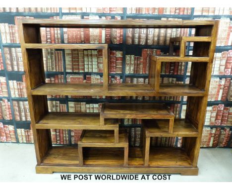 An oriental hardwood shelf unit or room divider (H151, W167, D35cm) 