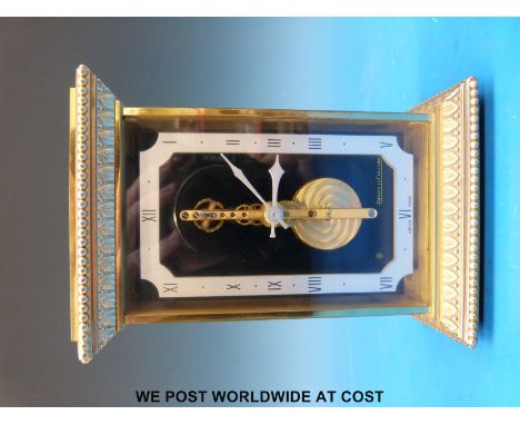 A Jaeger-LeCoultre mantel clock with visible movement (height 14.5cm)