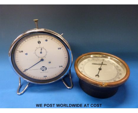 A Pye timer together with a brass-cased aneroid barometer