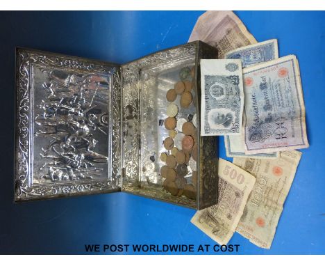 A collection of coins and early 20thC German notes etc in Dutch vintage tin, embossed