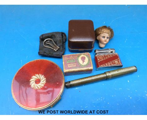 A Philips fountain pen, compact, lighter, small ceramic dolls head etc 