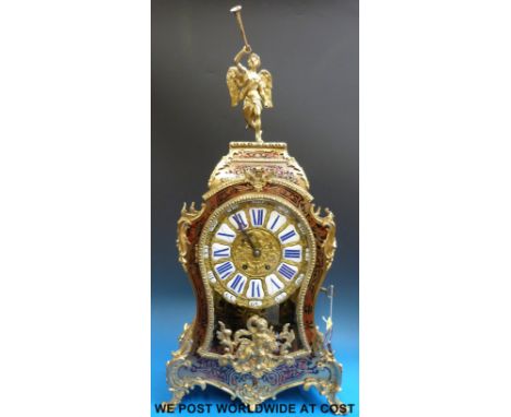 A large boulle mantel clock with anonymous striking movement, the gilt case with faux tortoiseshell inlay, the dial with blue