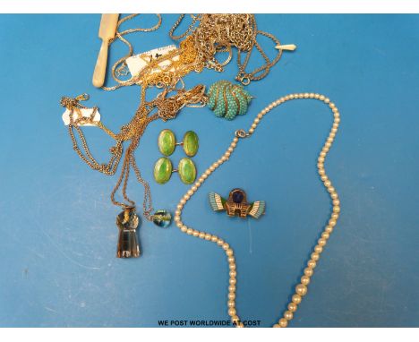 A single strand pearl necklace, silver chains, millefiori pendant, Egyptian revival enamel brooch marked 800, quartz pendant 