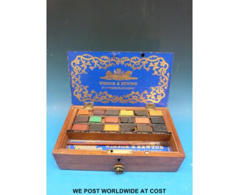 A late 19th century or early 20th century Winsor & Newton watercolour paint box, containing likely original Winsor & Newton p