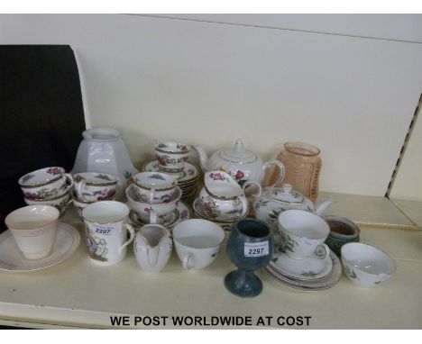 A collection of decorative tea cups and saucers
