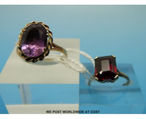 Two 9ct gold rings, one set with an amethyst (size M) and the other a garnet (size K) 